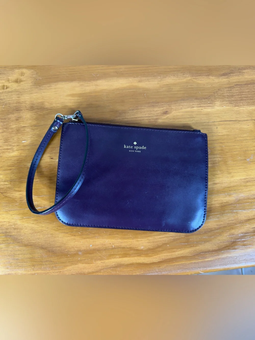 kate spade Purple leather wristlet with strap